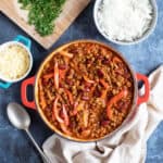 Quorn chilli con carne with rice and grated cheese.