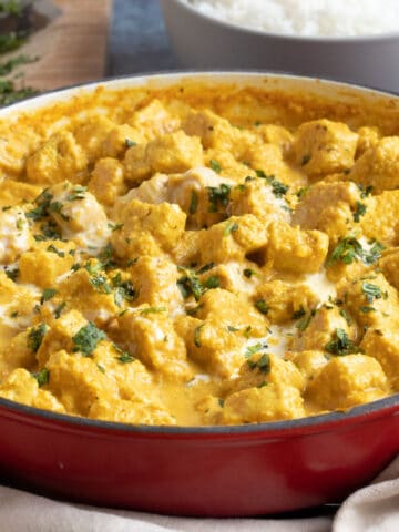 Quorn curry in a red pan.