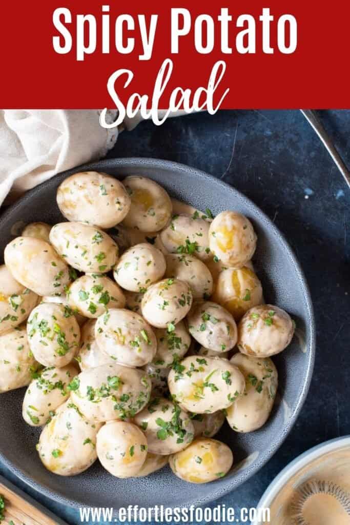 Spicy potato salad pin image.