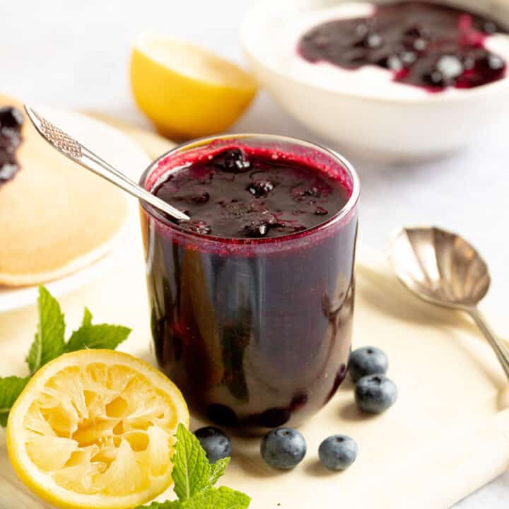 Blueberry compote in glass jar.