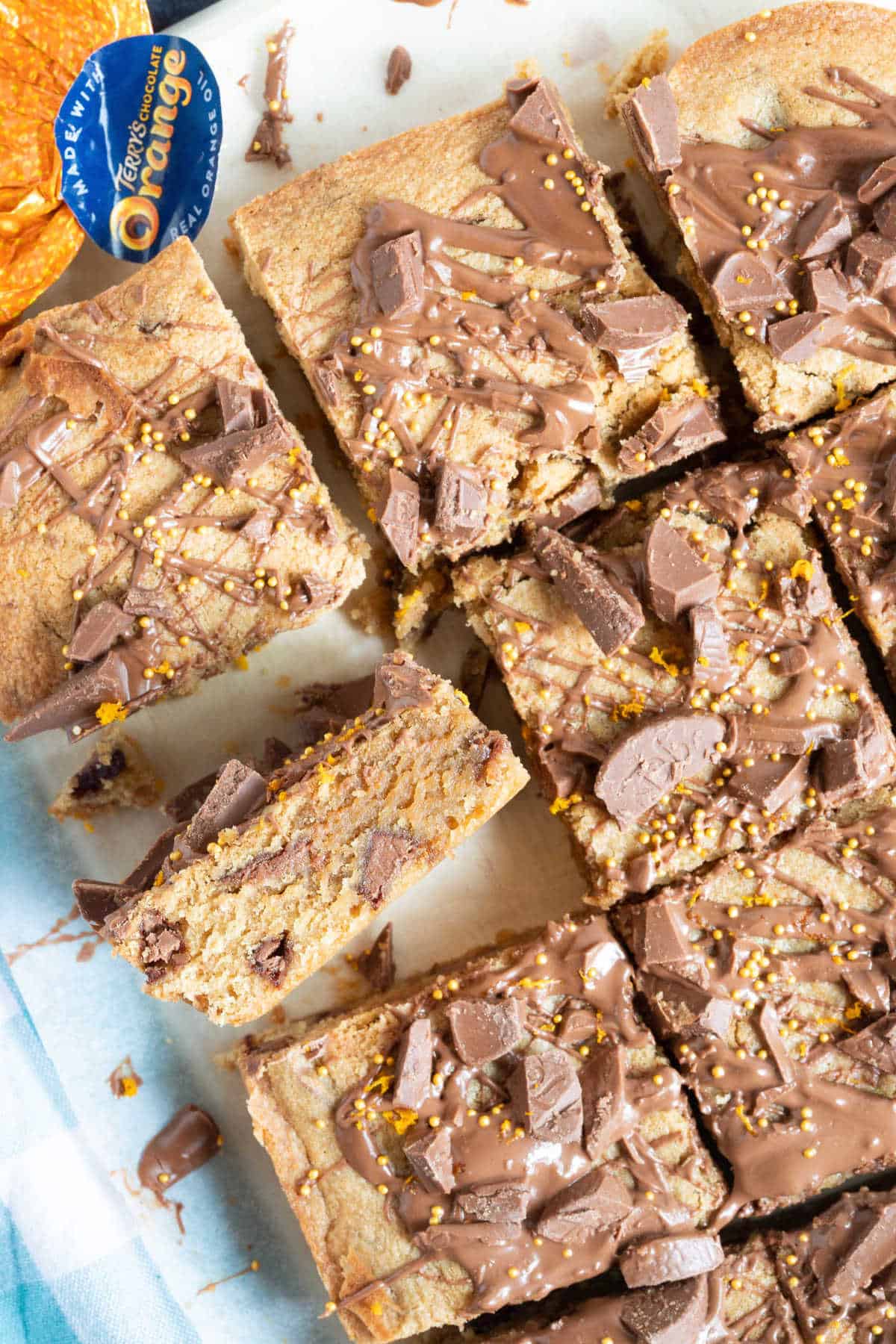 Chocolate orange tray bake sliced up into squares.