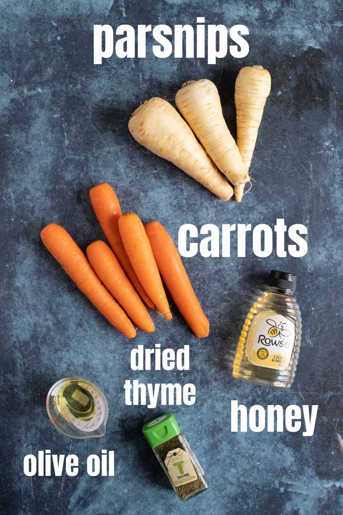 Ingredients needed for honey roasted carrots and parsnips.