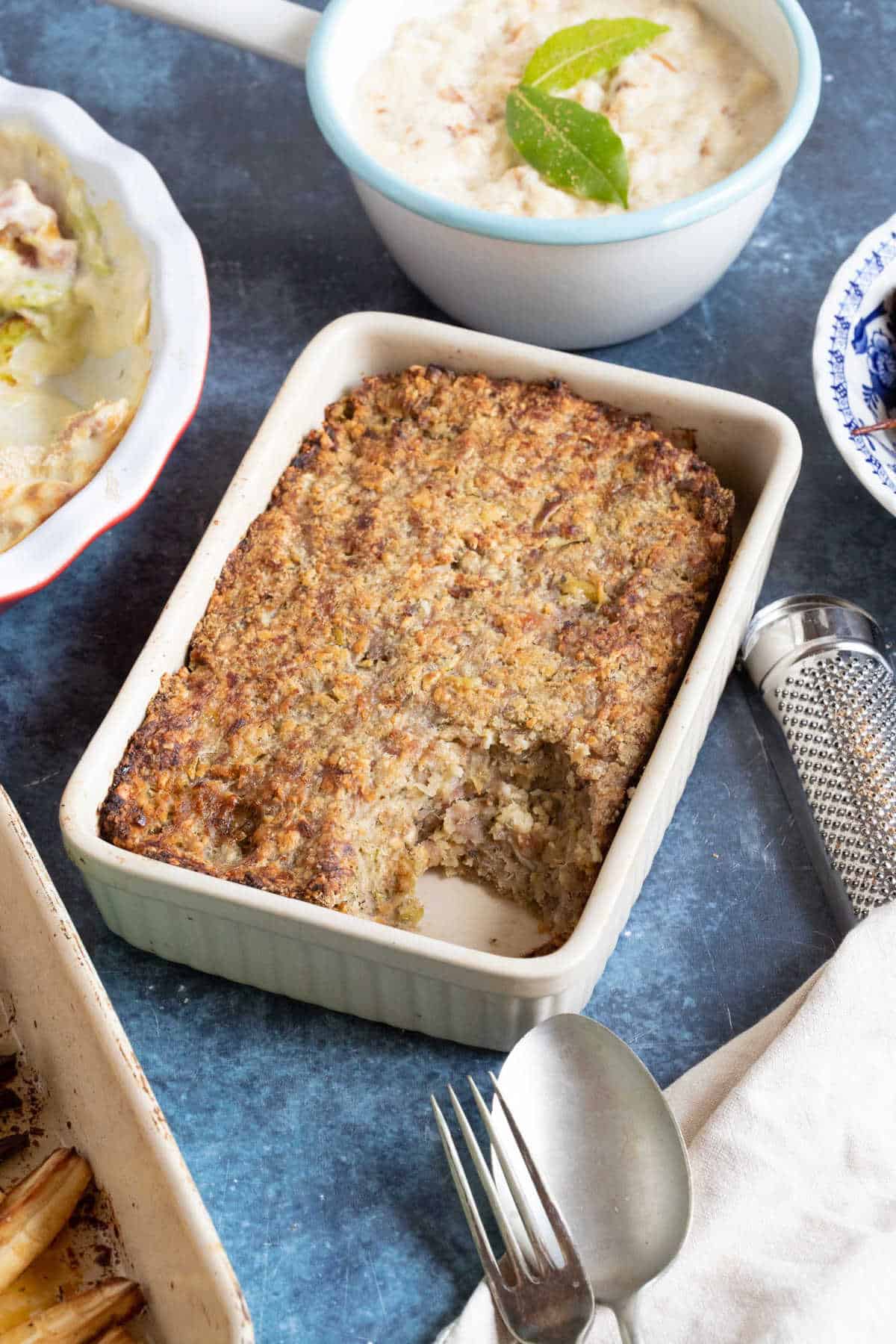 Sausage meat stuffing in a baking dish served with Christmas dinner.