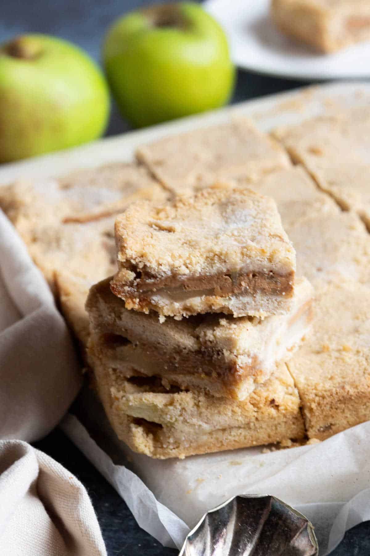 A stack of caramel apple pie bars.