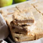 A stack of caramel apple pie bars.