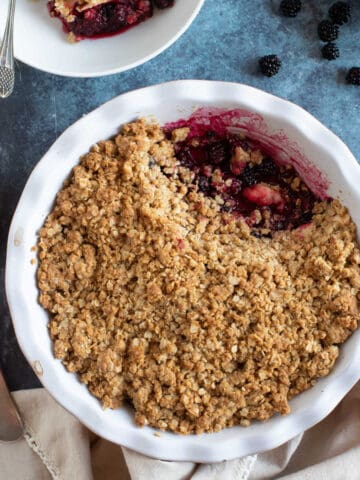 Blackberry crumble in a serving dish.