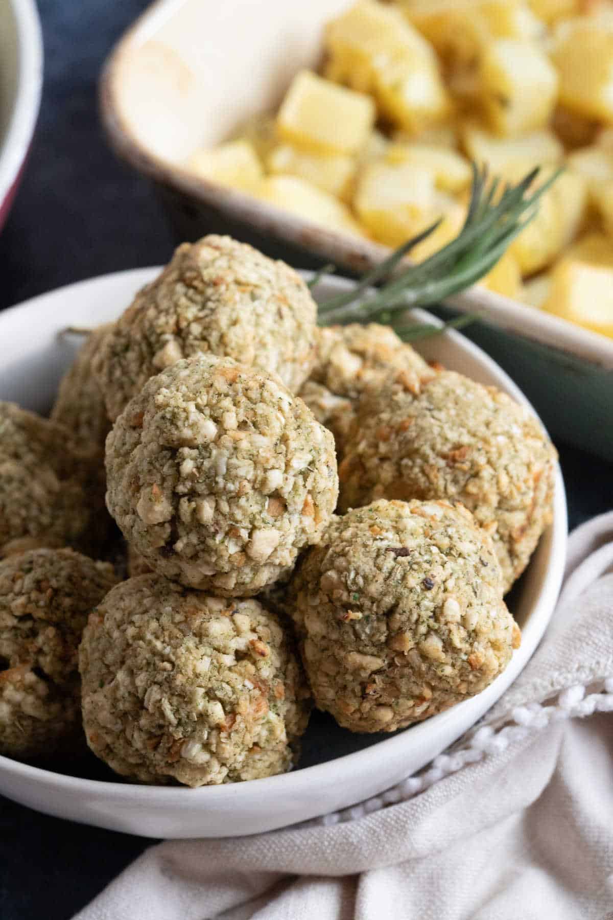 Air fryer stuffing balls in a serving dish.