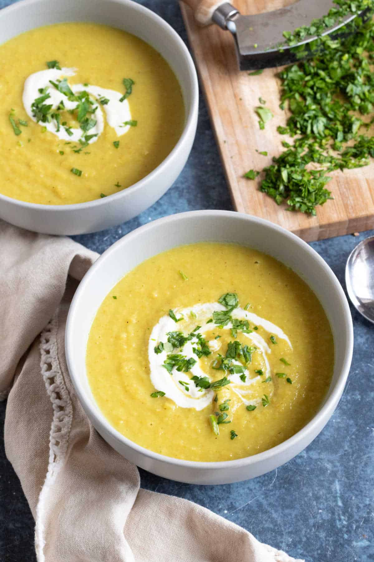 A bowl of curried parsnip and apple soup.