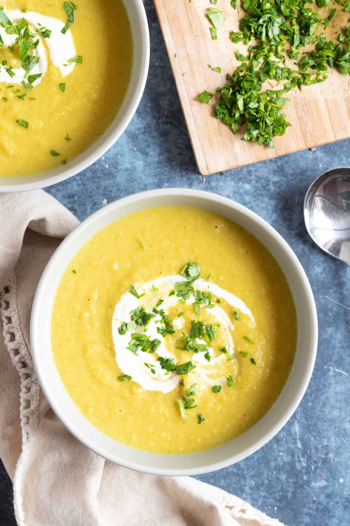 Parsnip soup with a swirl of creme fraiche.