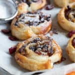 Mincemeat pinwheels dusted with icing sugar.