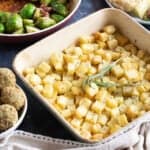 Parmentier potatoes in a roasting tin.