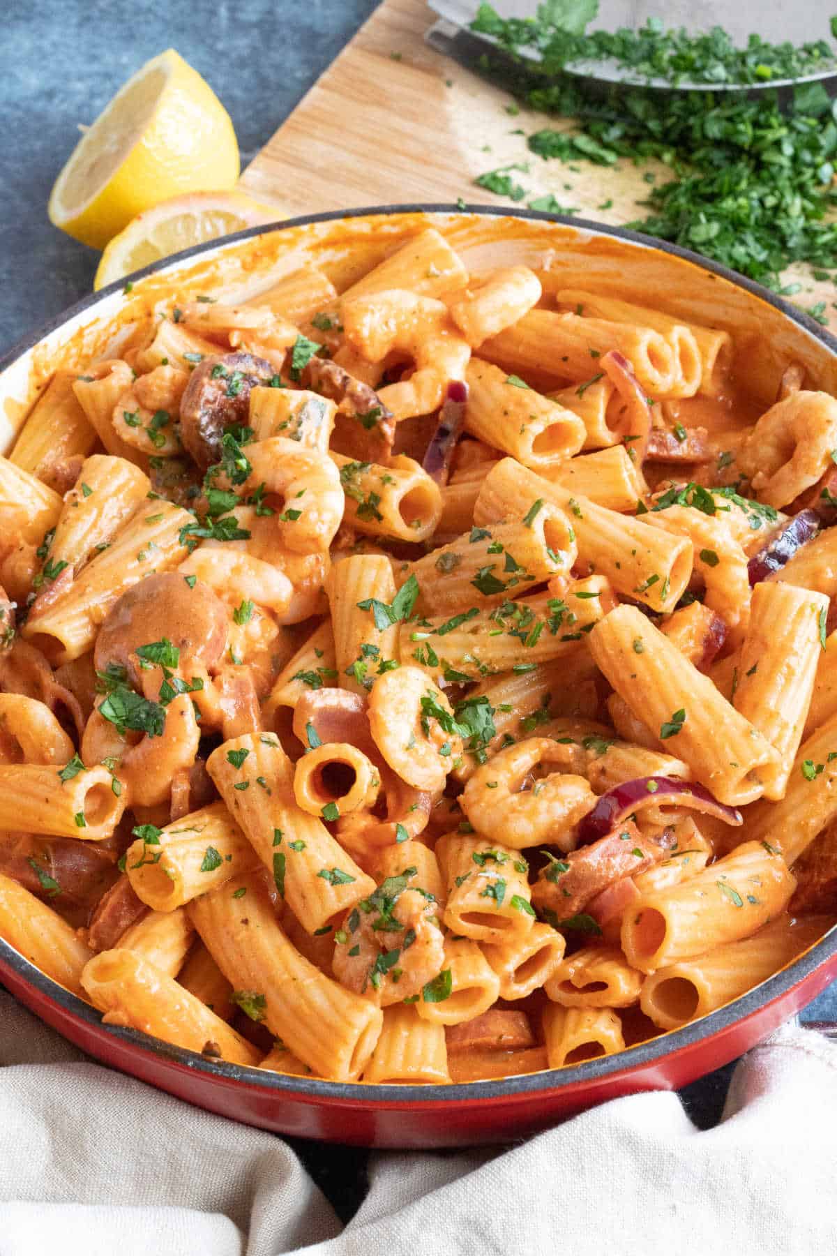 Creamy chorizo and prawn pasta in a pan.