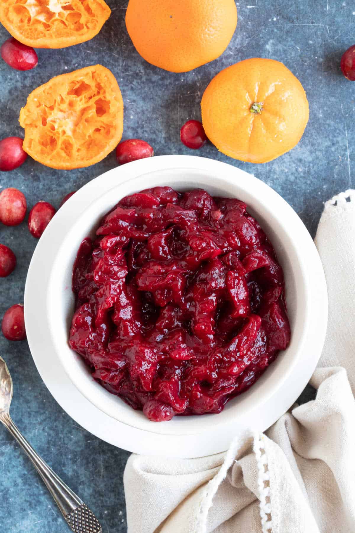 Homemade cranberry sauce in a white serving dish.