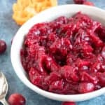 Homemade cranberry sauce in a white bowl.