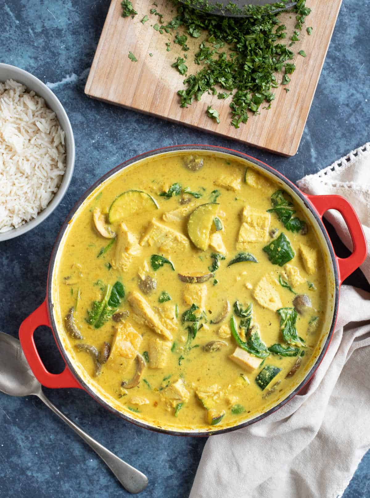 Turkey curry served with rice and chopped coriander.