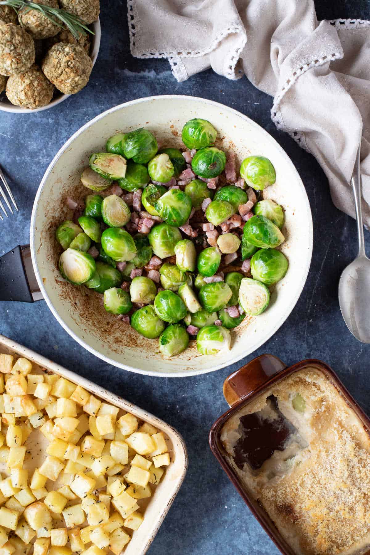 Pan fried Brussels sprouts with stuffing, cheesy leeks and parmentier potatoes.