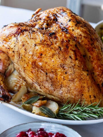 Slow cooker turkey crown on a serving plate.