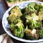 Air fryer broccoli parmesan in a bowl.