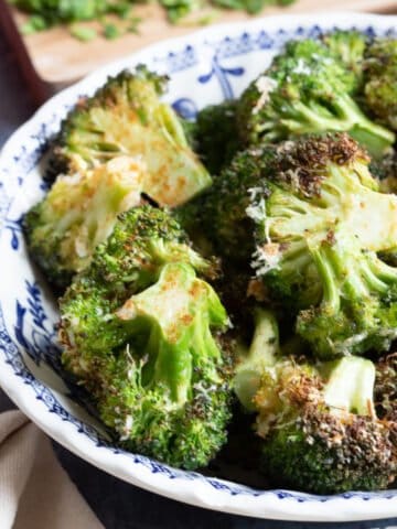 Air fryer broccoli parmesan in a bowl.