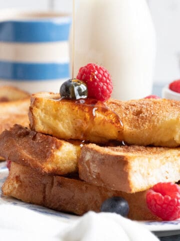 Air fryer French toast drizzled with maple syrup.