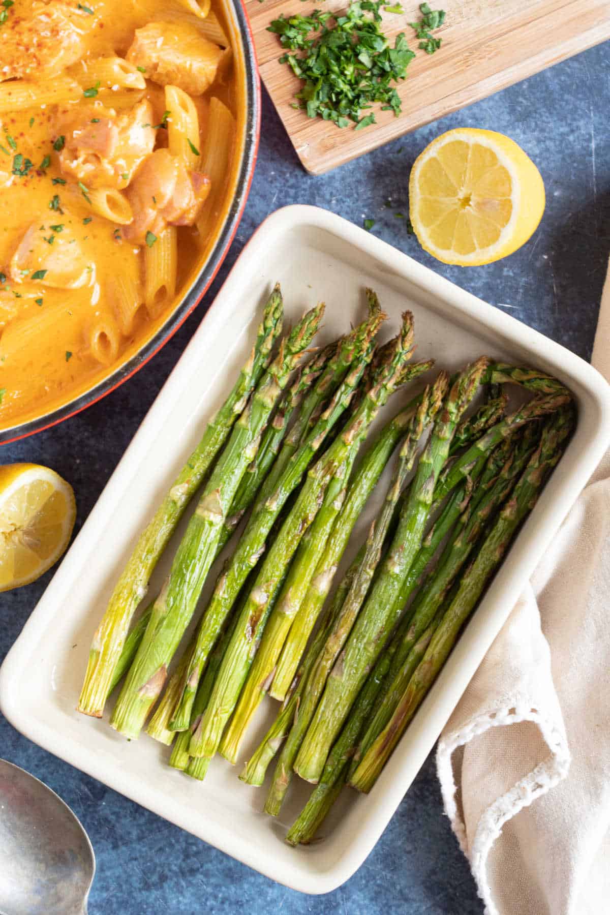 Air fried asparagus in a serving dish.