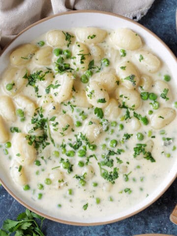 A plate of creamy gnocchi.