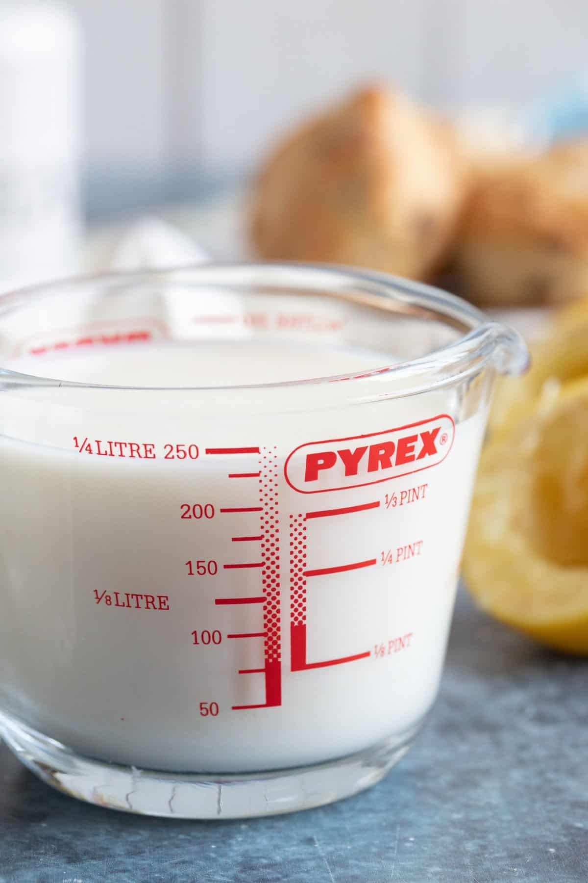 A jug of buttermilk made at home with lemons and milk.