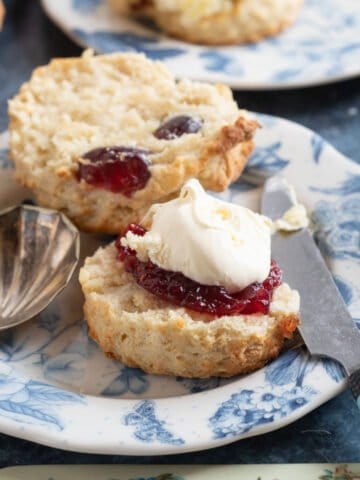 CHerry and almond scone with jam and clotted cream.
