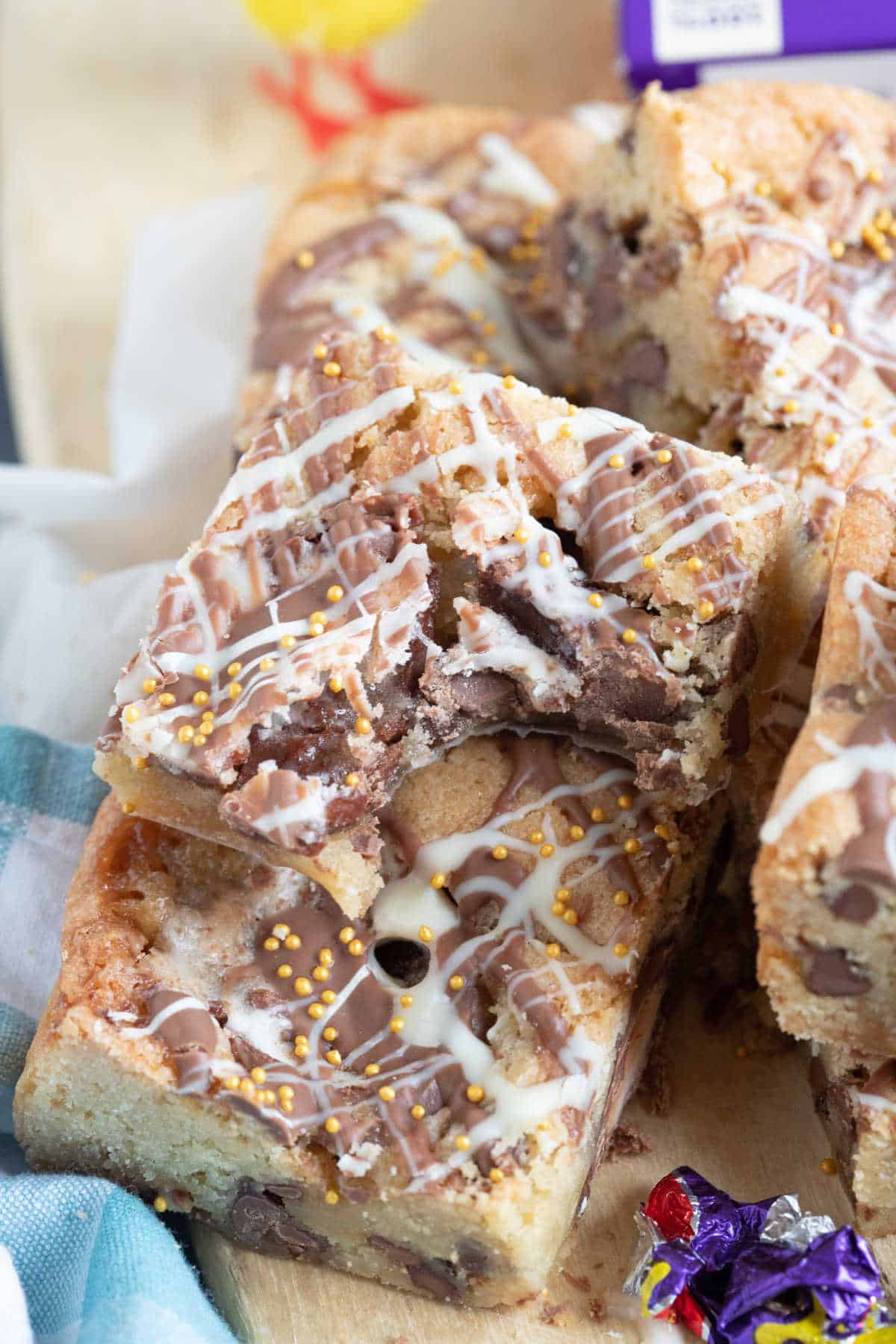 Creme egg blondie with a bite taken out of it.