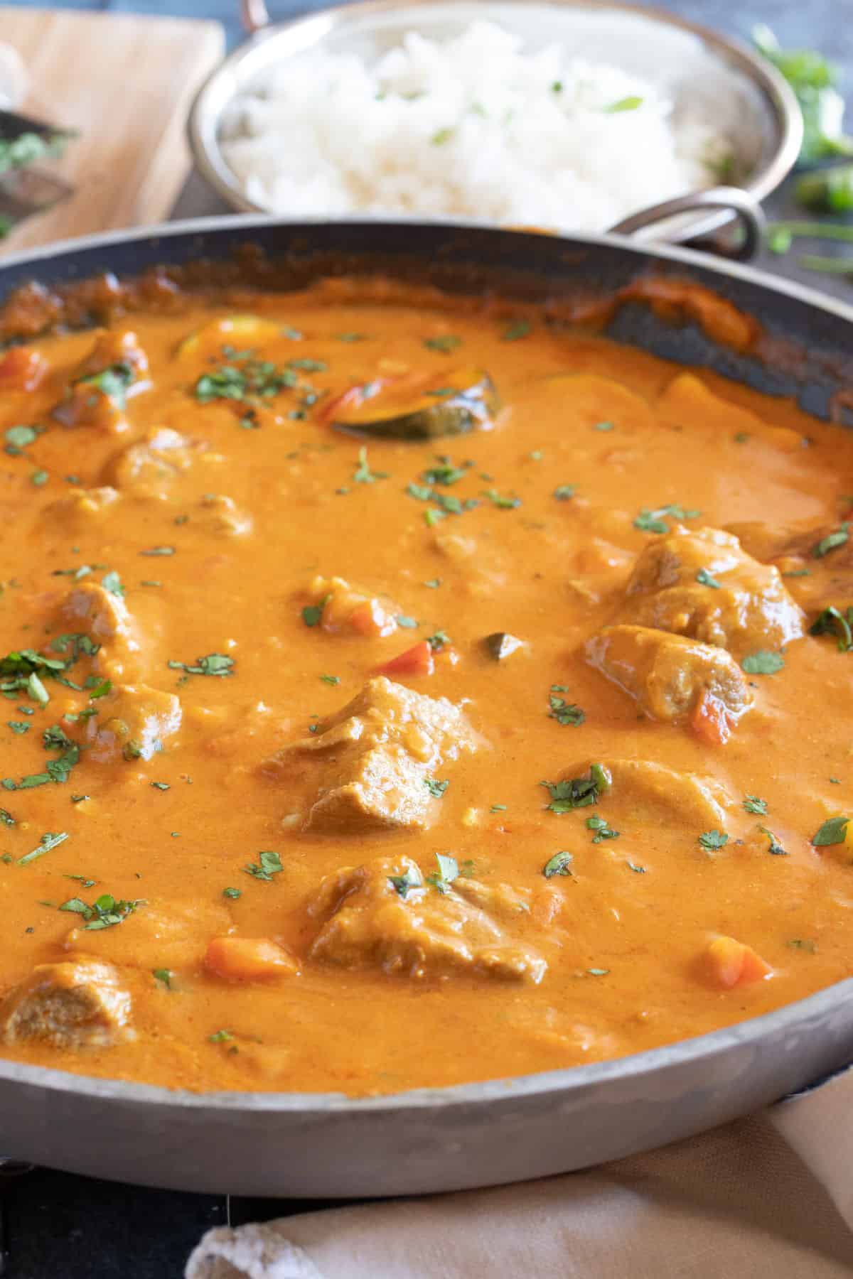 Lamb tikka masala bubbling away in a pan.