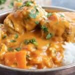 Lamb tikka masala in a bowl with rice.