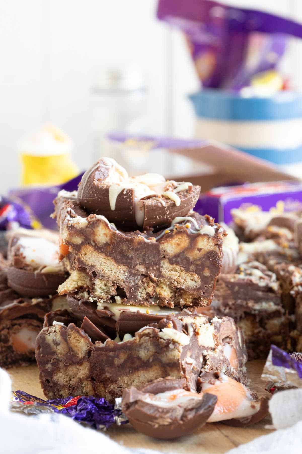 Creme egg tiffin bars stacked on top of each other.
