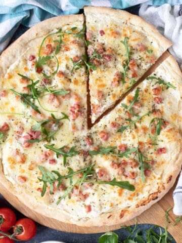 Pizza bianco with pancetta and rocket.