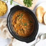 Slow cooker beef curry in a slow cooker.