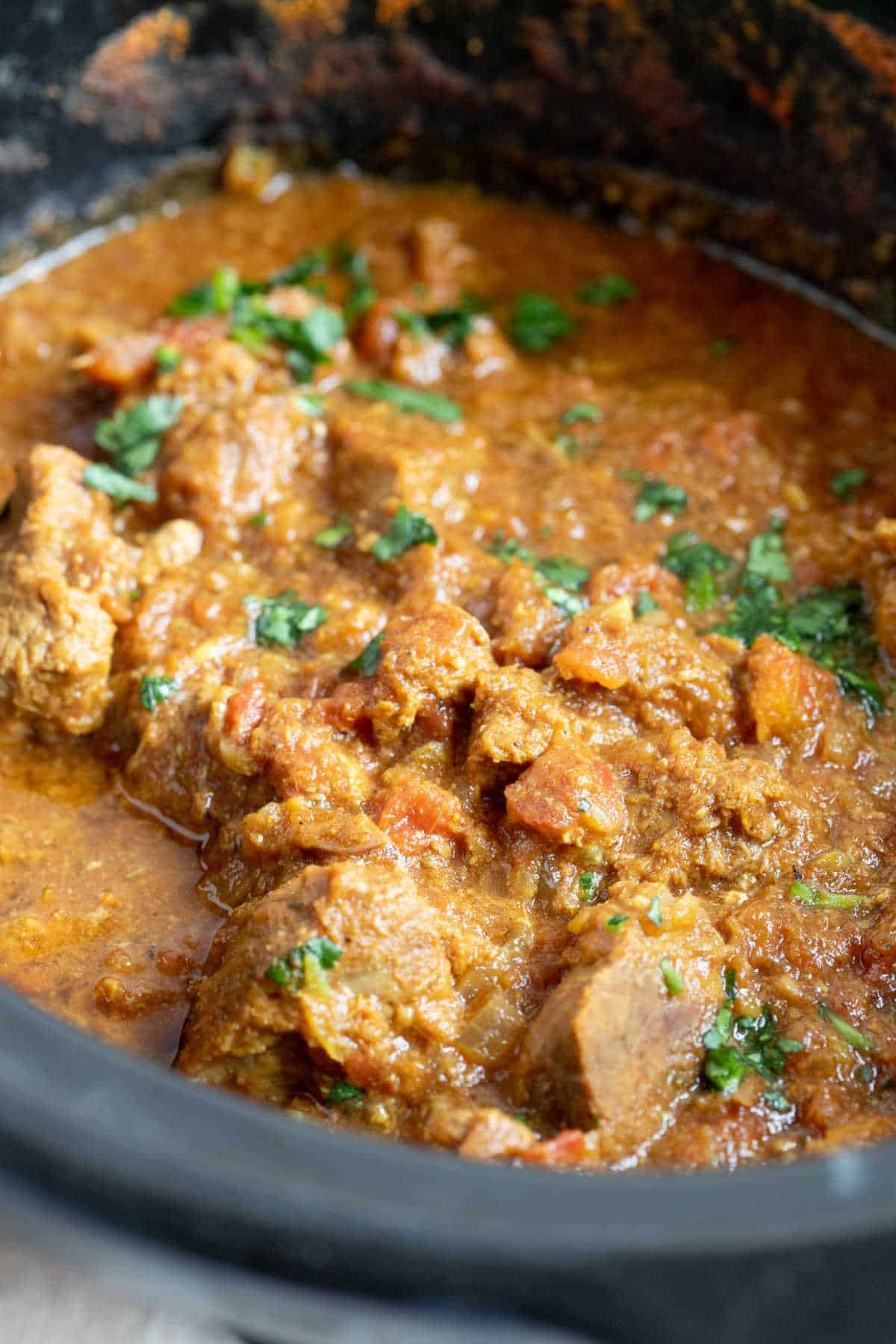 Slow cooker beef curry in crockpot.