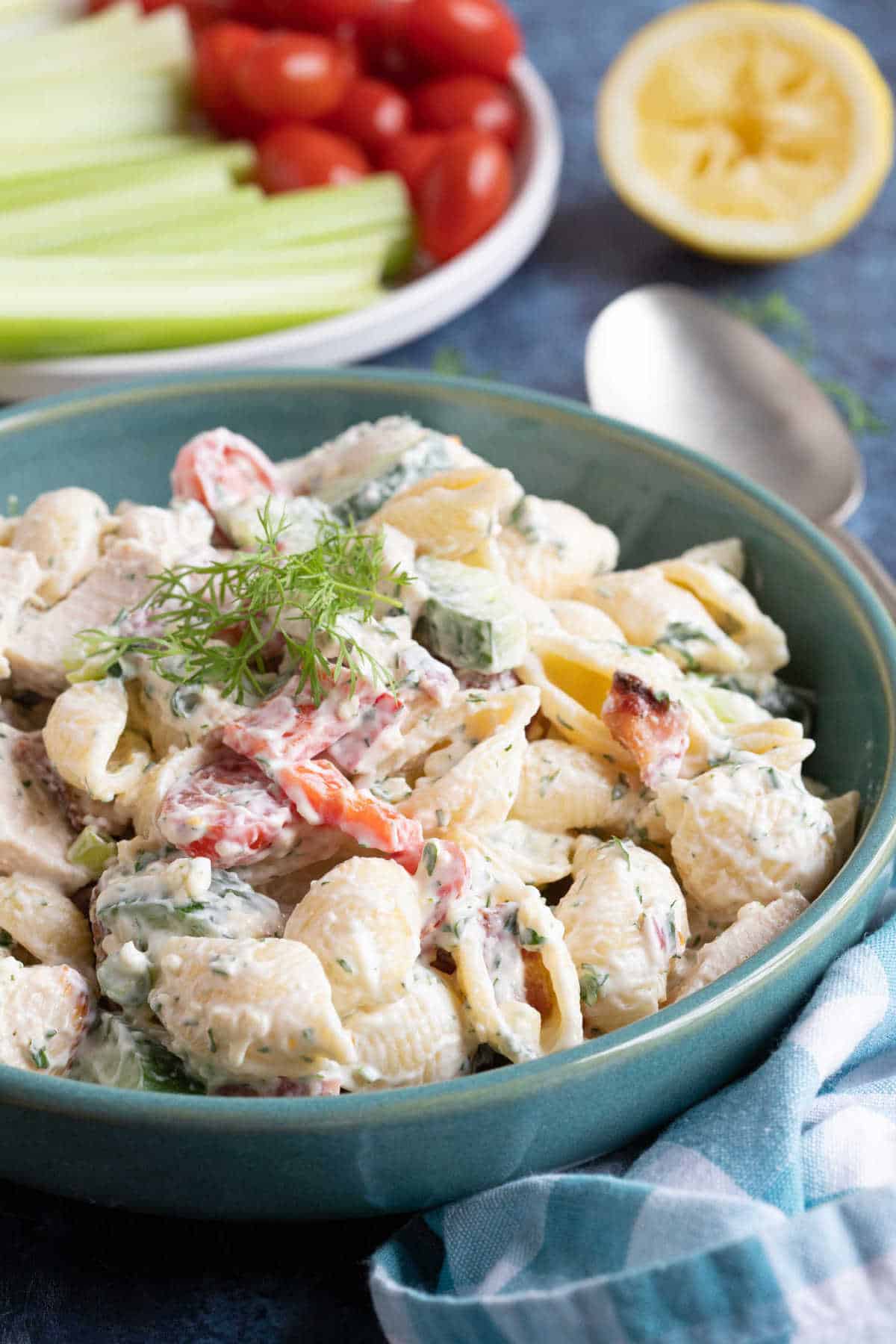 Chicken and bacon pasta salad in a serving bowl.