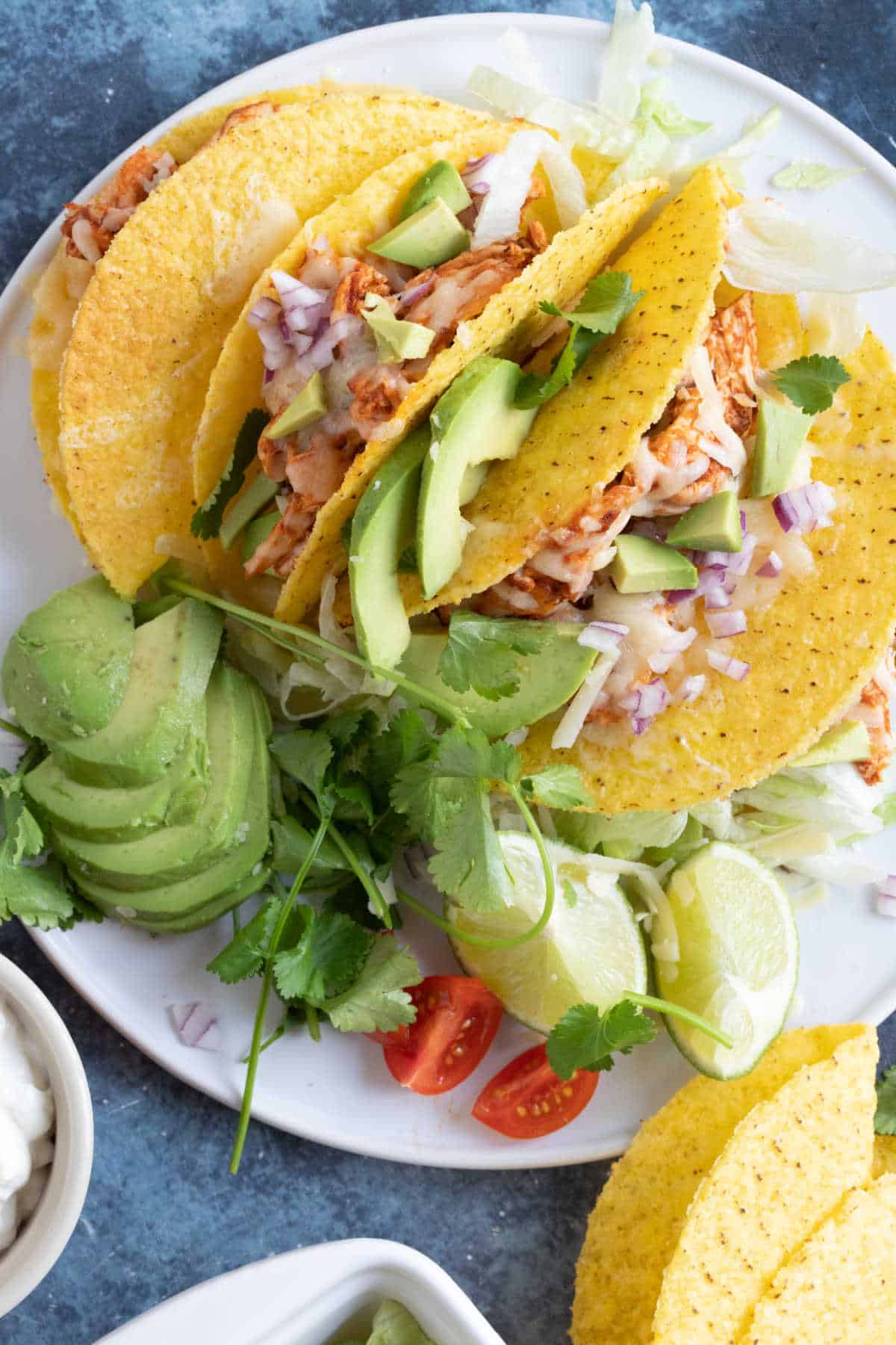 Chicken tacos in corn tortilla shells.