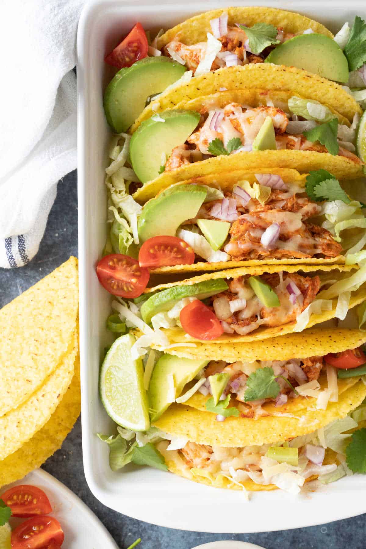 Leftover roast chicken tacos in a baking dish.