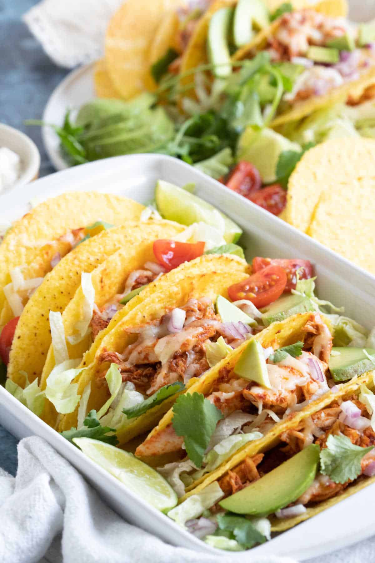 Leftover roast chicken tacos in a baking dish.