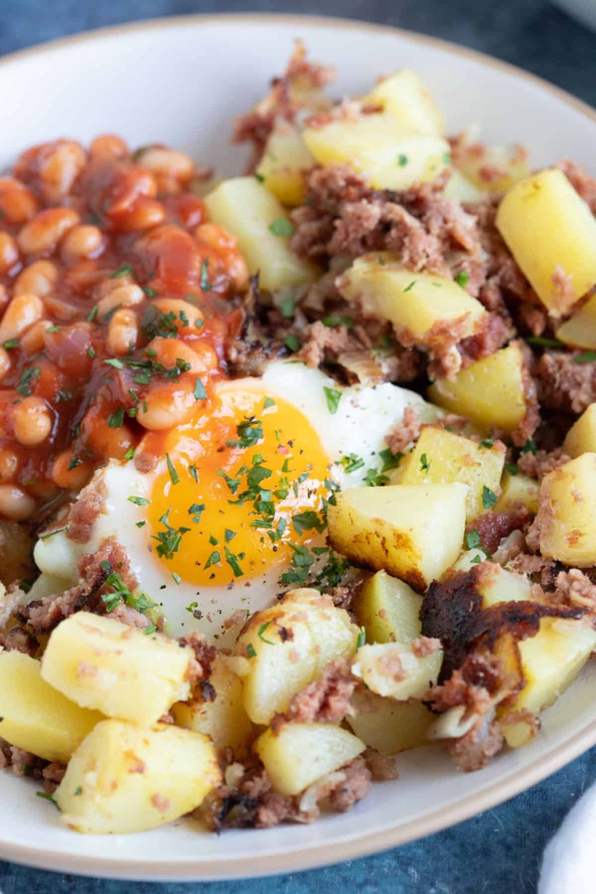 Corned beef hash with baked beans.