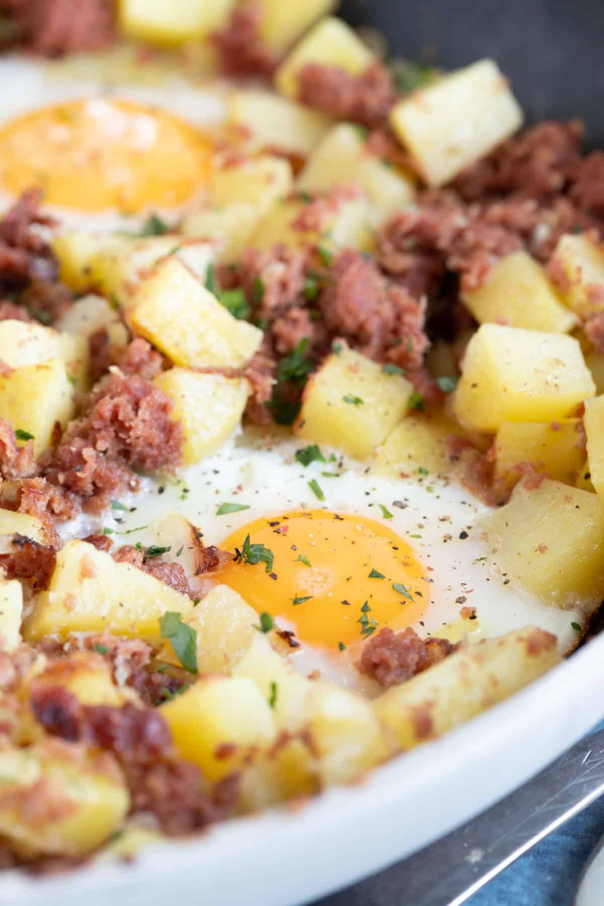 Corned beef hash in a frying pan.