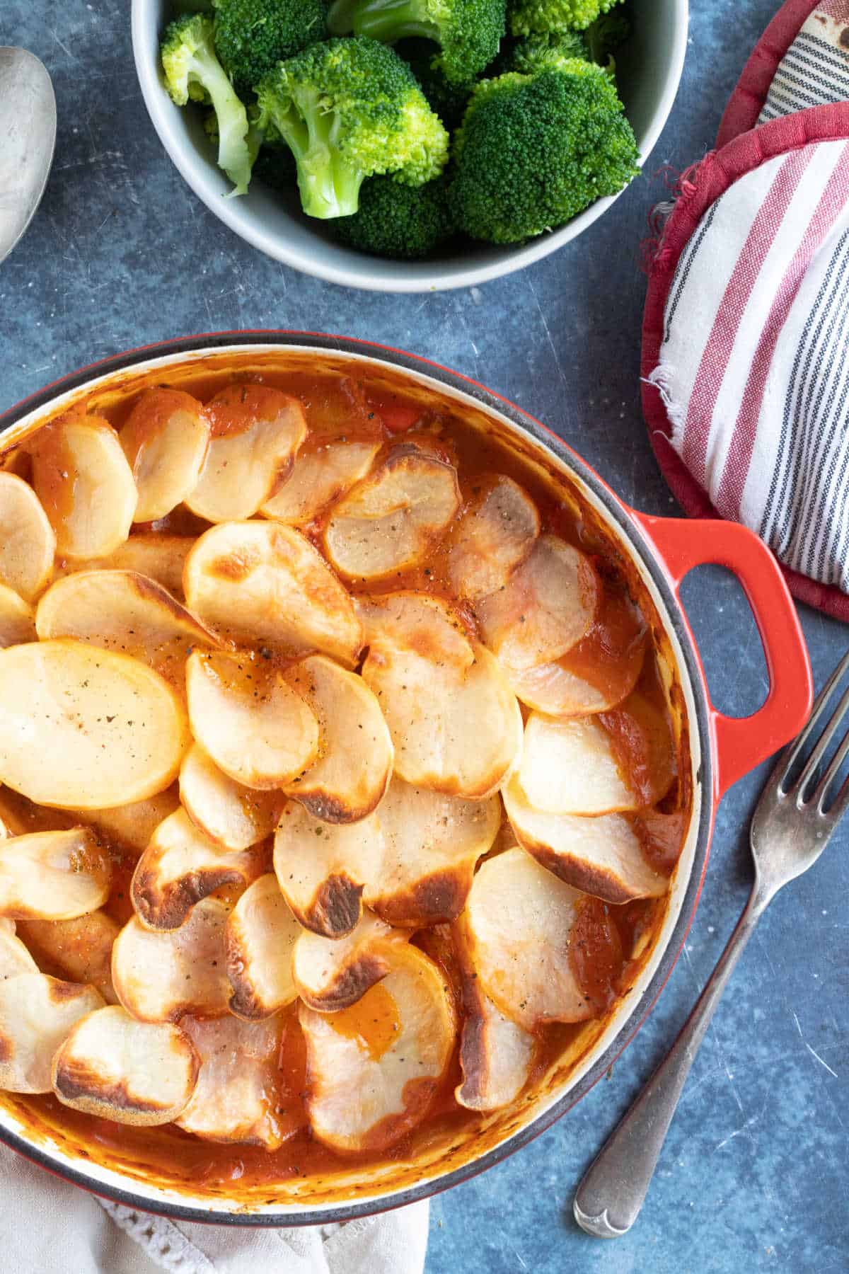 Sausage hotpot with broccoli.