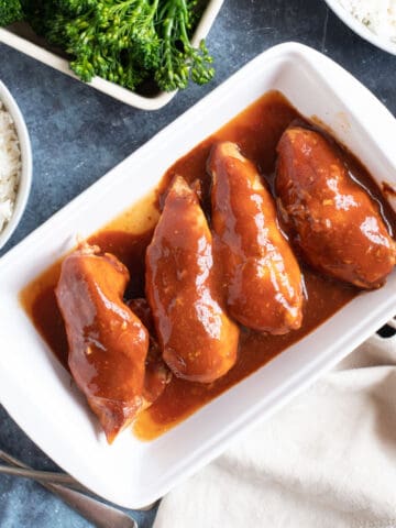 Diet coke chicken in a white serving dish.