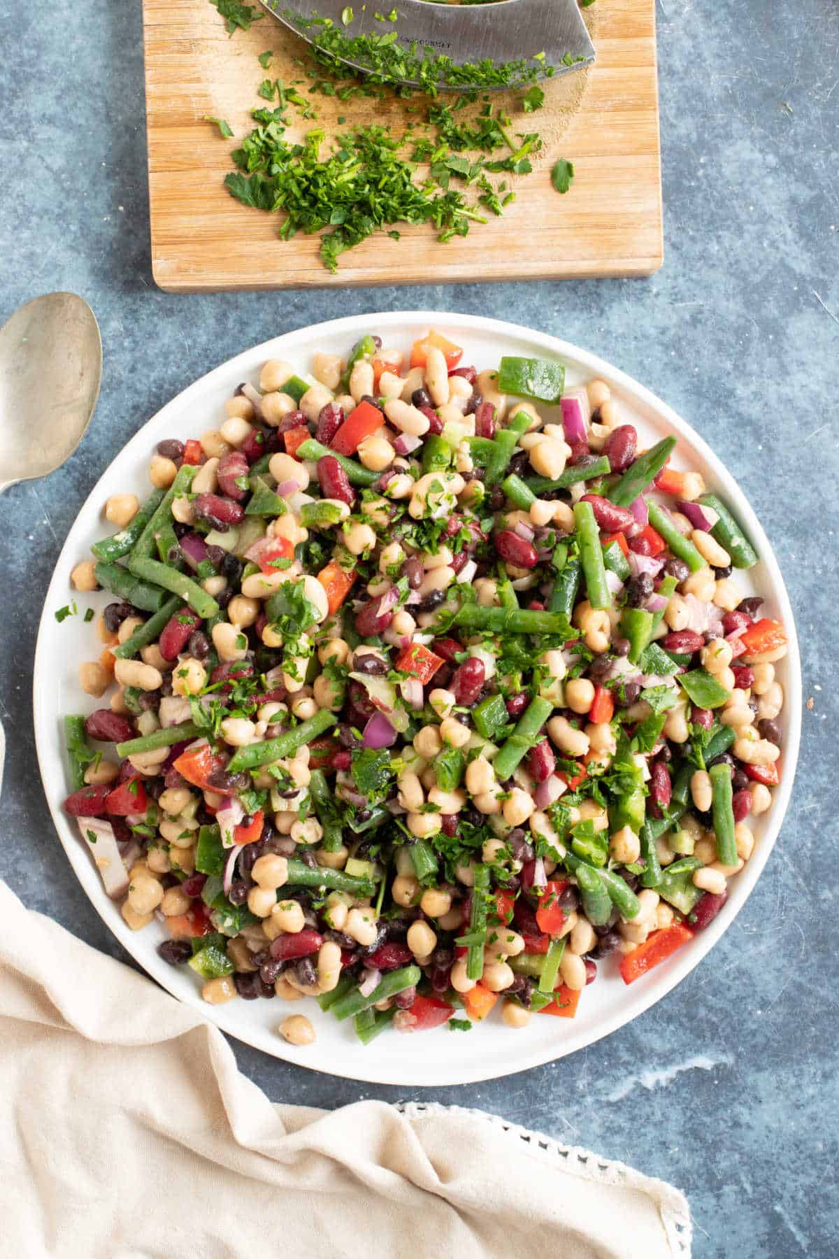 5 bean salad garnished with parsley.