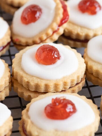 Empire biscuits topped with glace cherry.