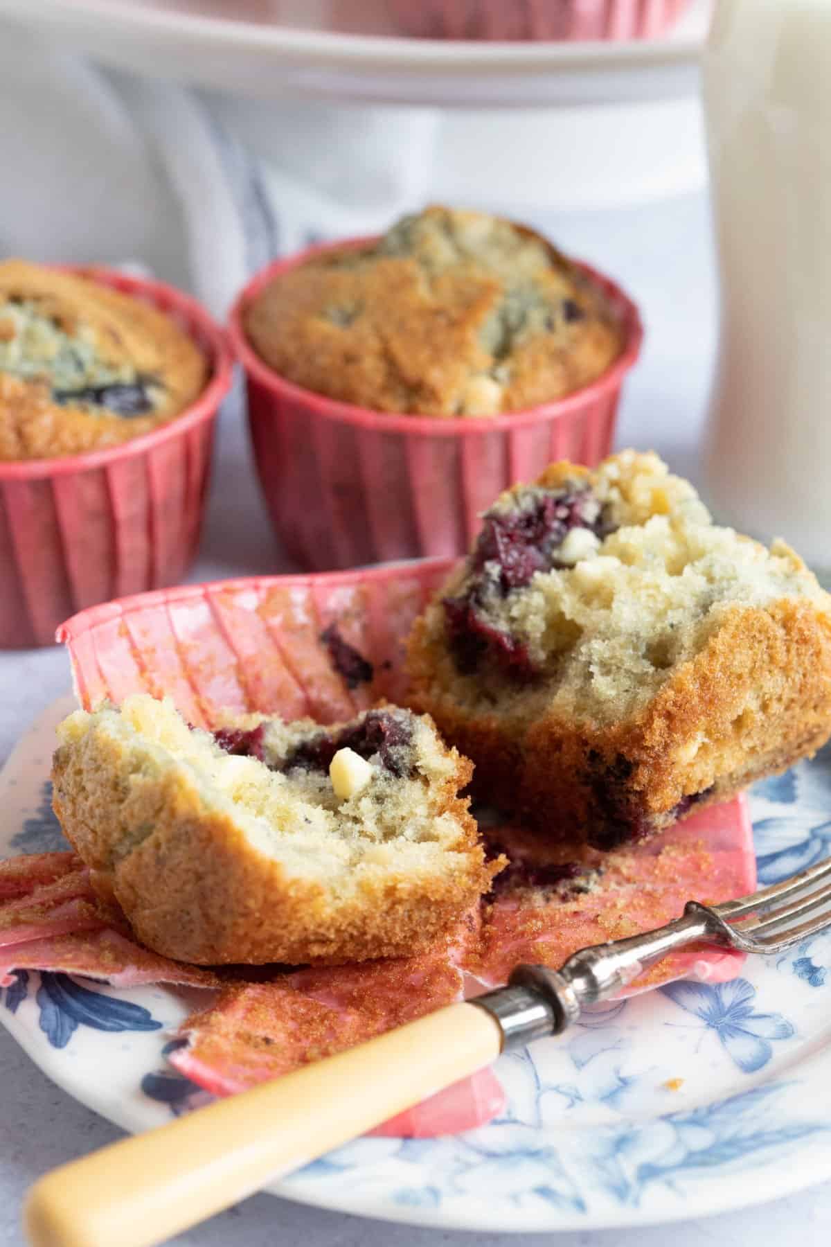 A cherry muffin broken in half.