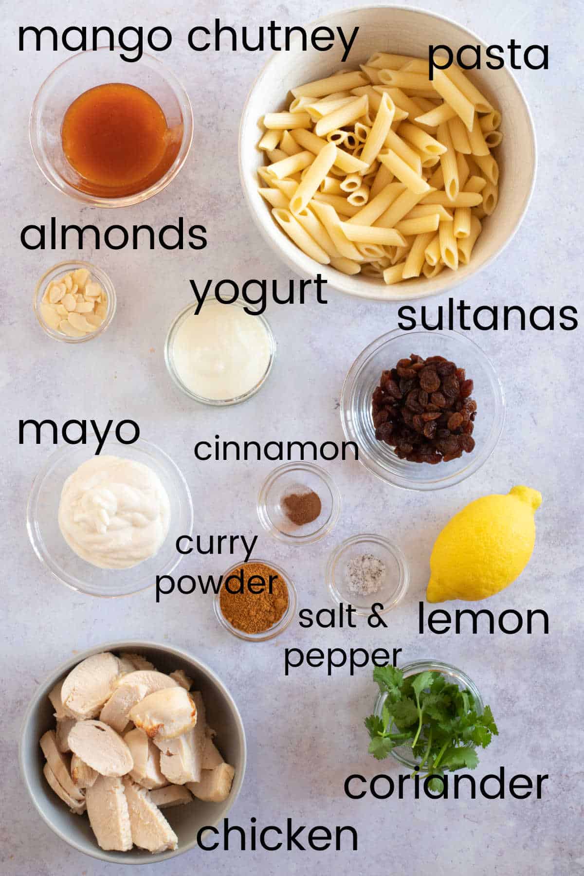 Ingredients for coronation chicken pasta salad.
