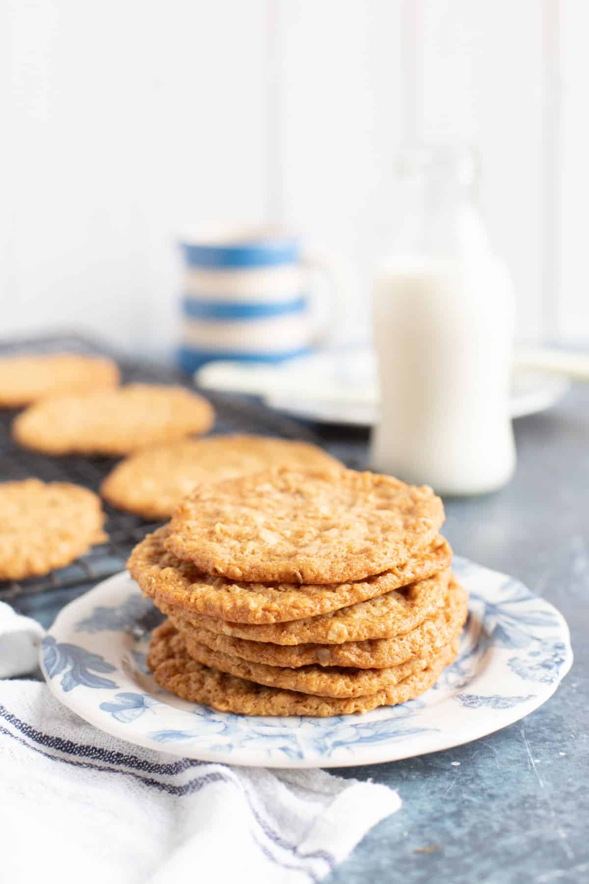 Golden syrup cookies with a glass of milk.