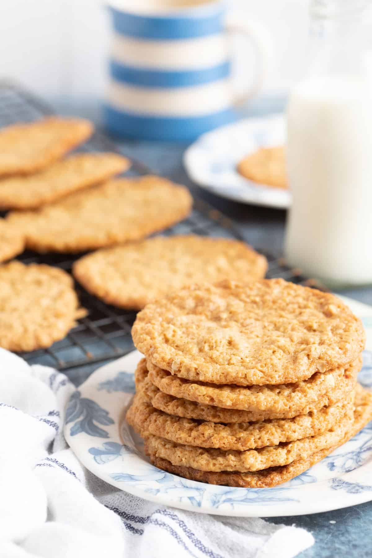 A stack of golden syrup cookies on a plate.