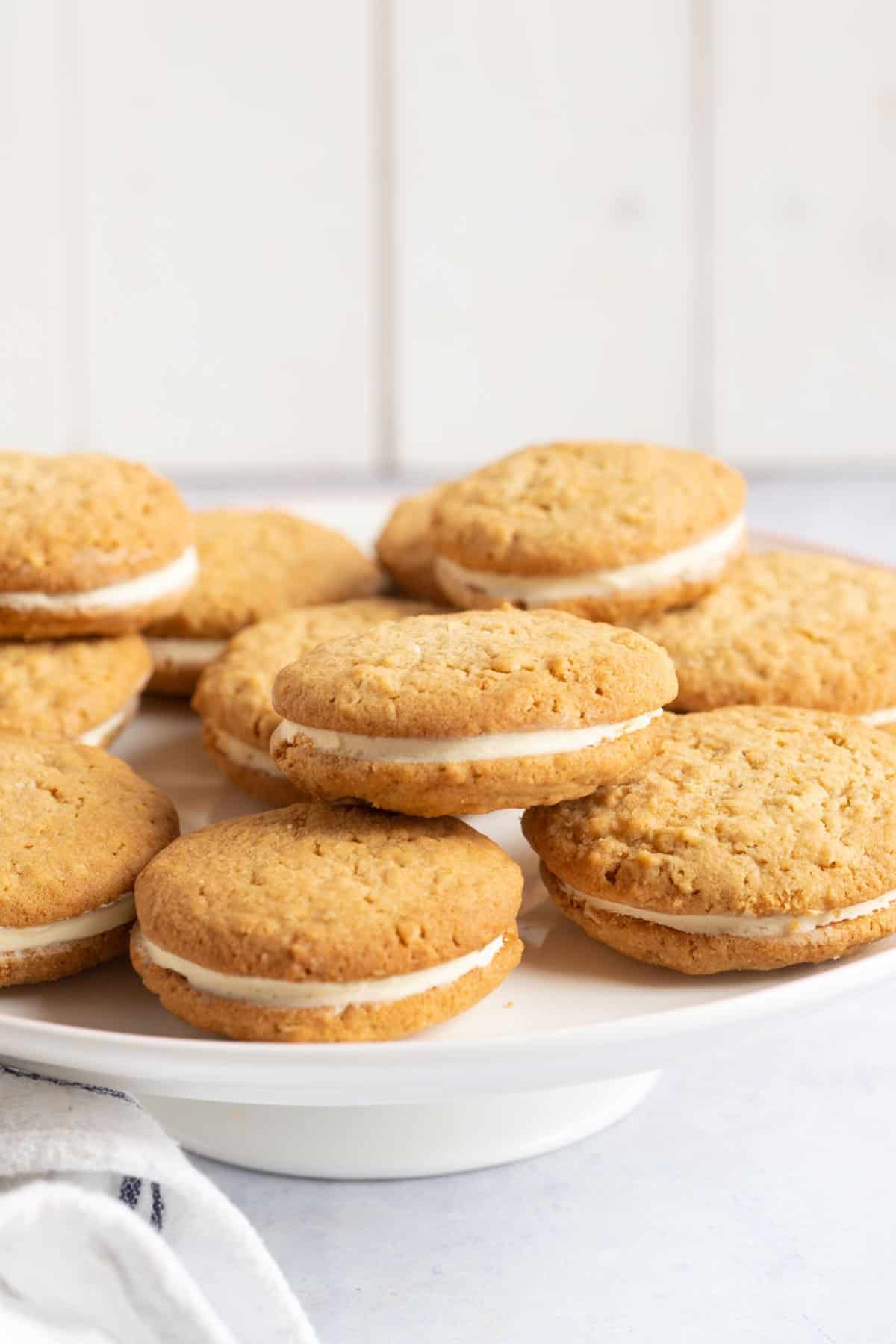 Gypsy cream biscuits on a cake stand.